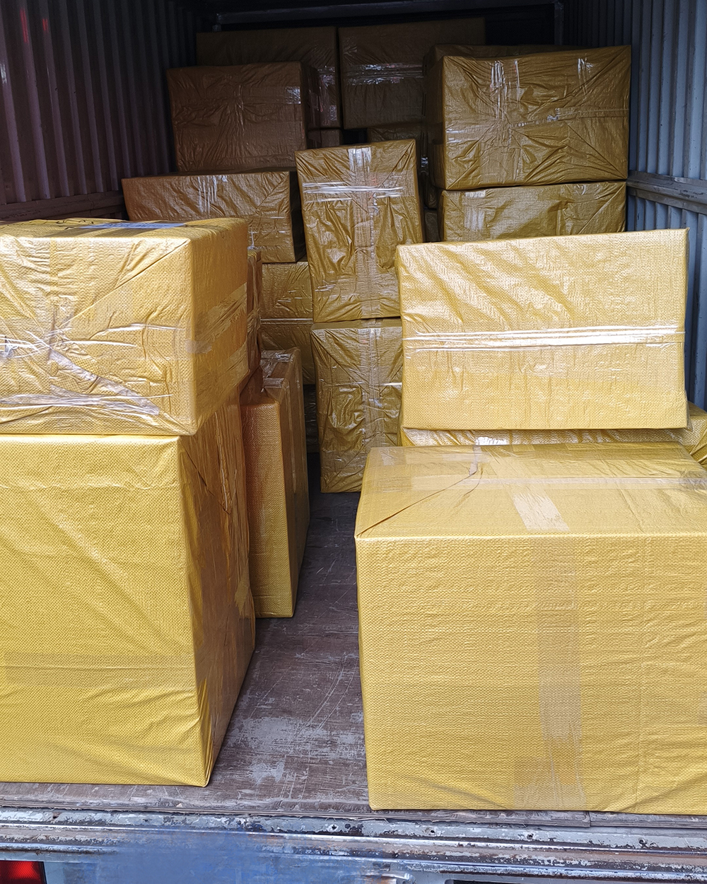 Truck loading process - goods being loaded