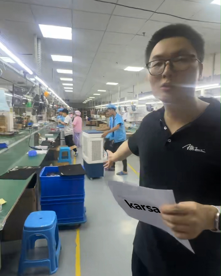 Factory production floor inspection China — verifying materials and build quality in progress