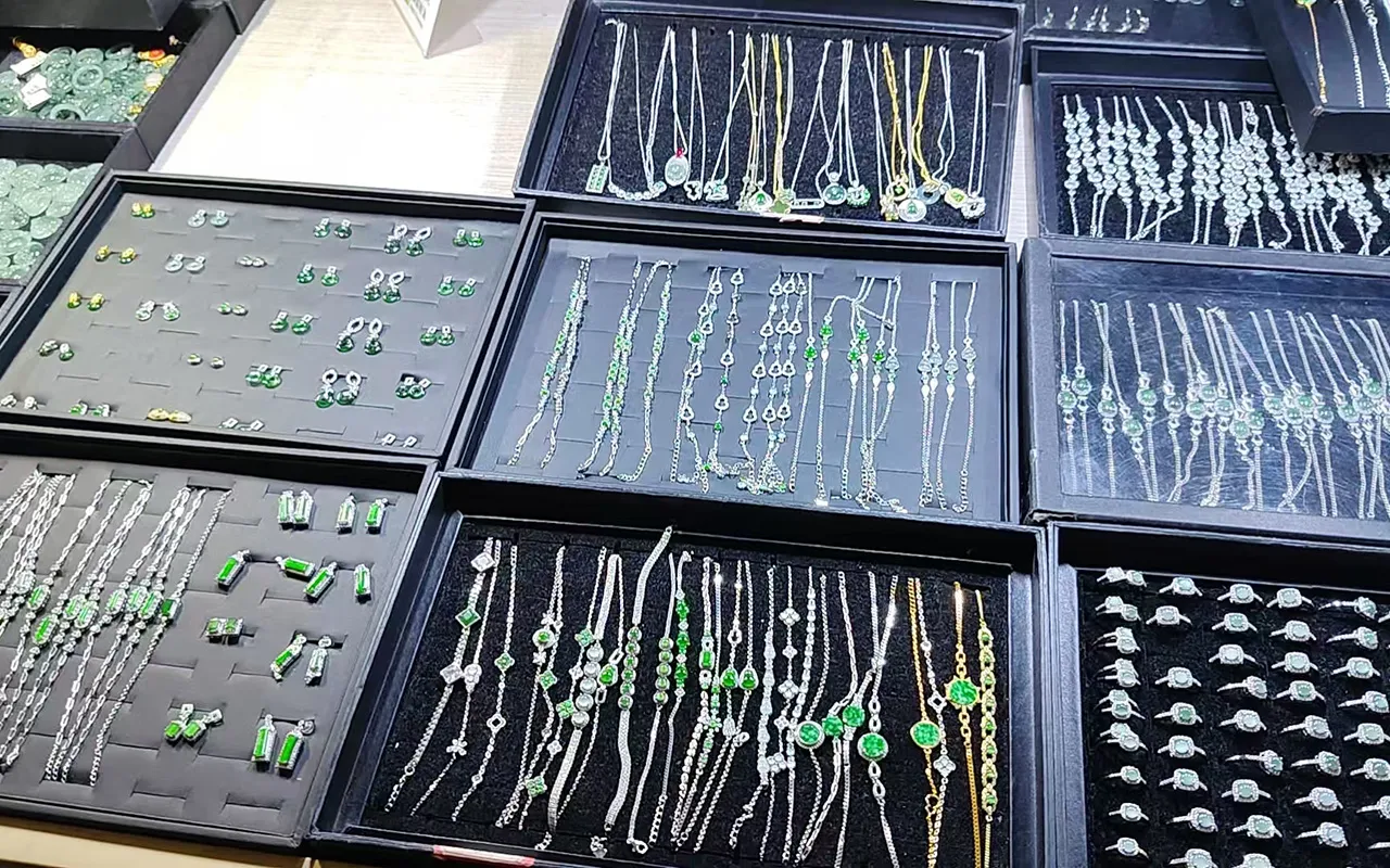 Jadeite bracelets and necklaces displayed at Sihui Tian'guangxu market