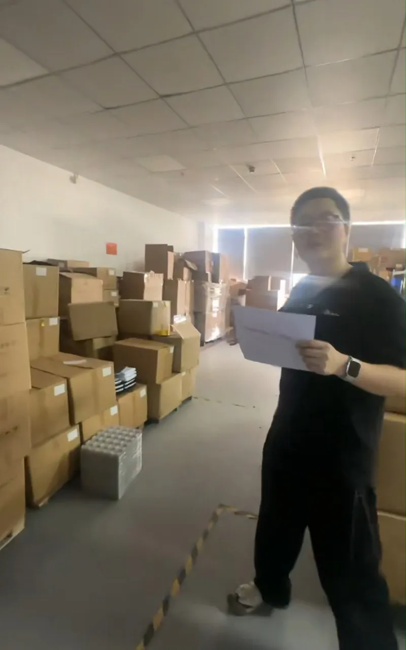 Karsa inspecting goods at Guangdong warehouse