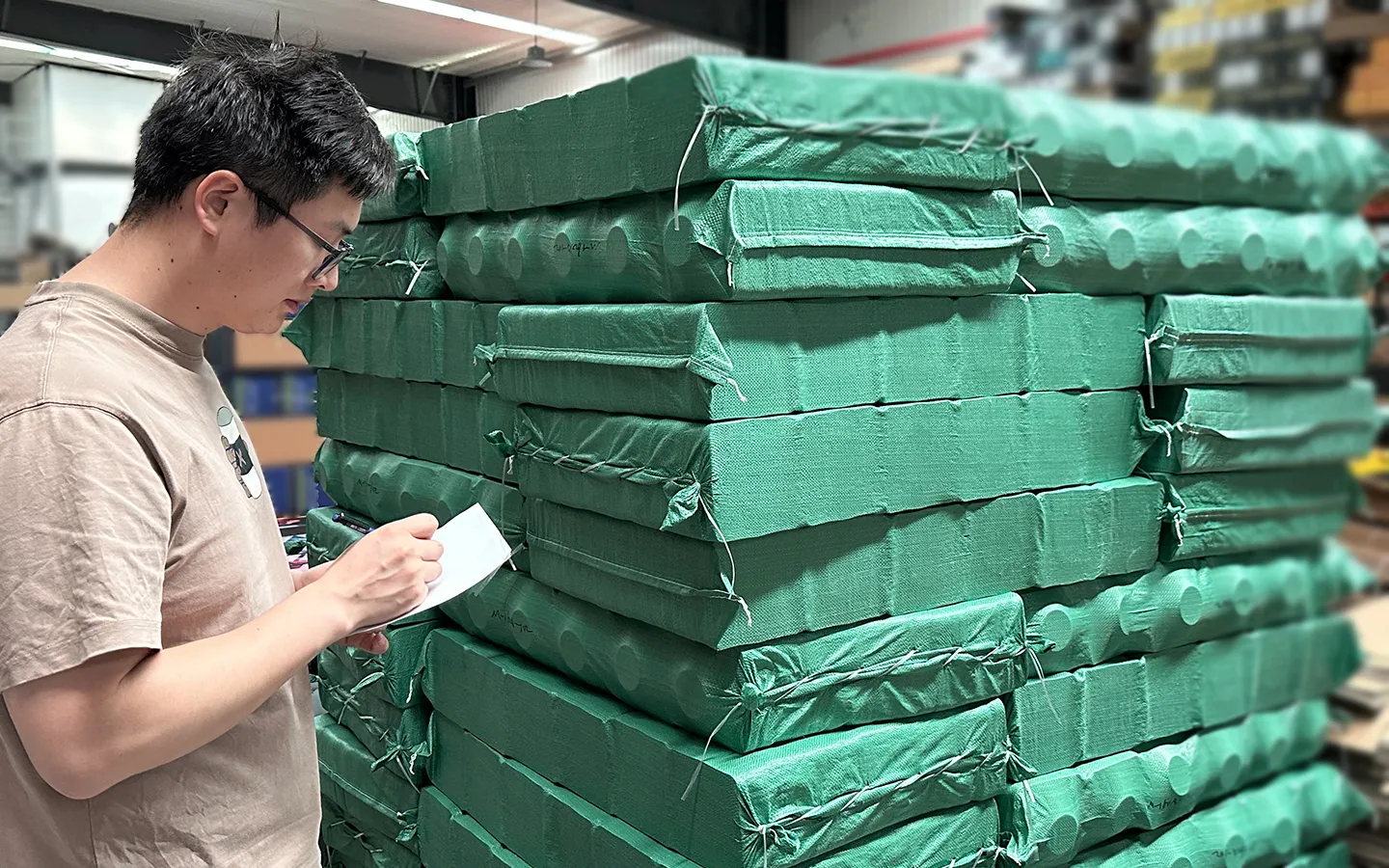 Karsa inspecting World Cup merchandise on behalf of a client