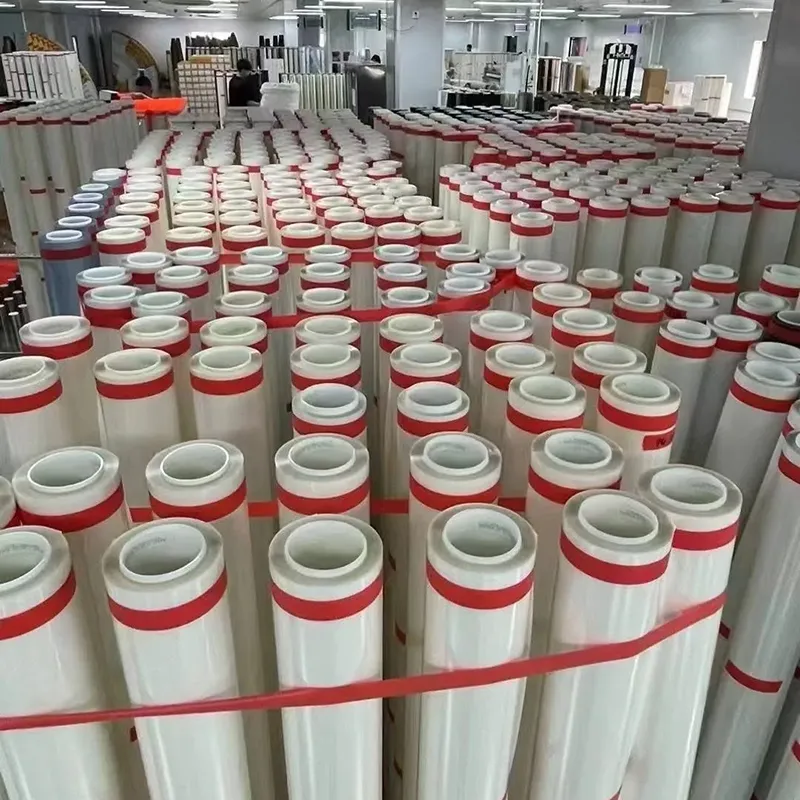 Large warehouse with wholesale PPF roll inventory — showing production scale at a China automotive film factory