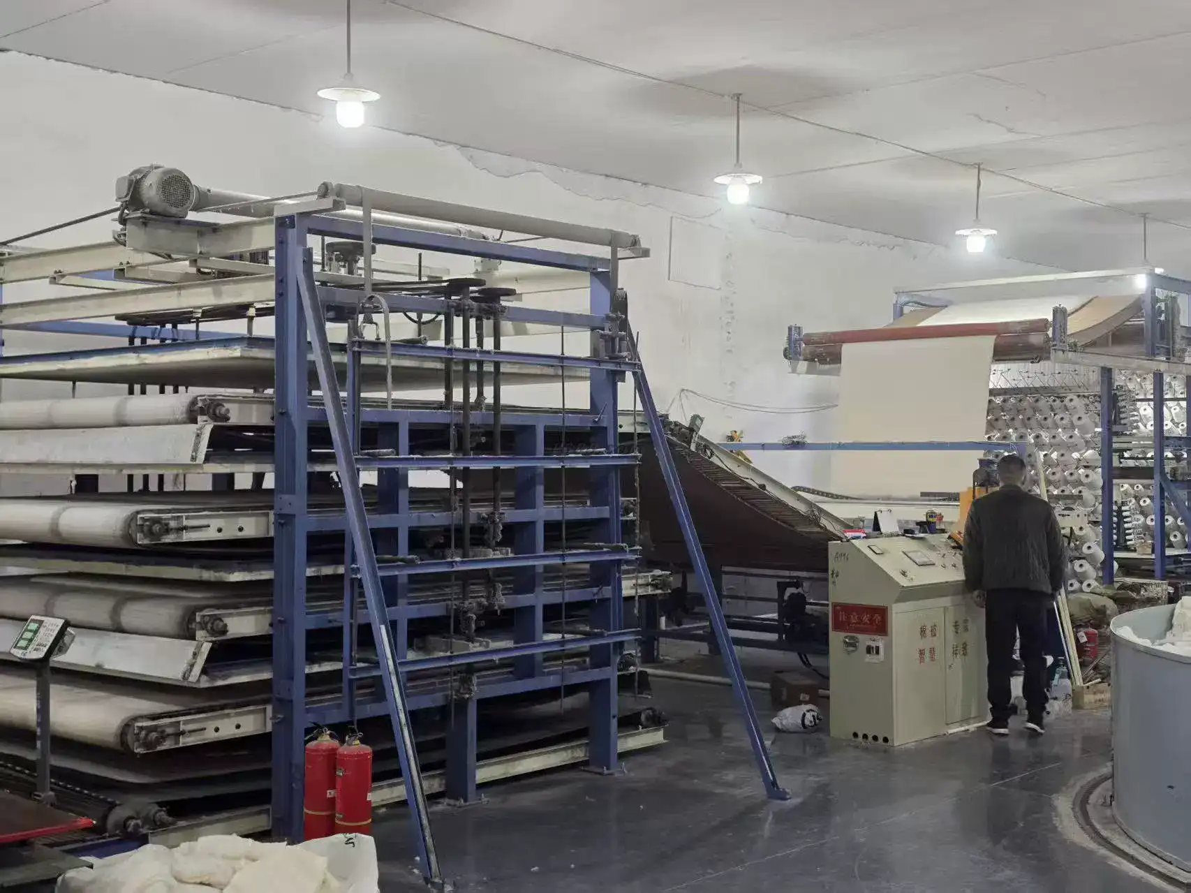 Industrial fabric printing machine in operation